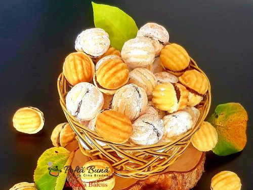 Nuci fragede cu unt umplute cu crema de ciocolata