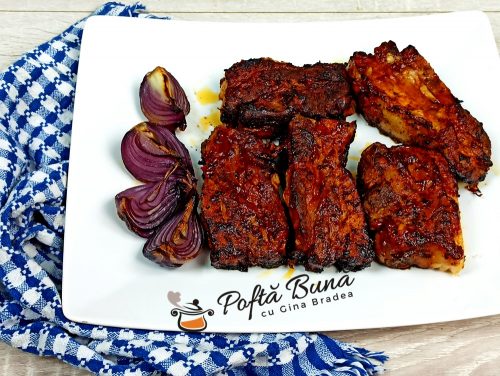 Costite la cuptor cu cimbru, usturoi si bere