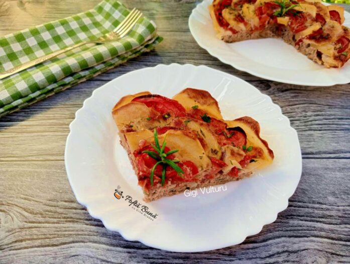 Cartofi cu carne tocata si rosii la cuptor cartofi cu carne tocata si rosii la cuptor 1 697x525 - Cartofi cu carne tocata si rosii la cuptor