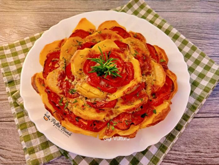 Cartofi cu carne tocata si rosii la cuptor