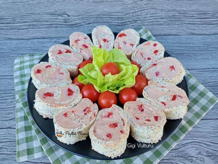 rulada aperitiv albusuri reteta gina bradea 2 697x525 - Prajitura din albusuri cu crema de frisca