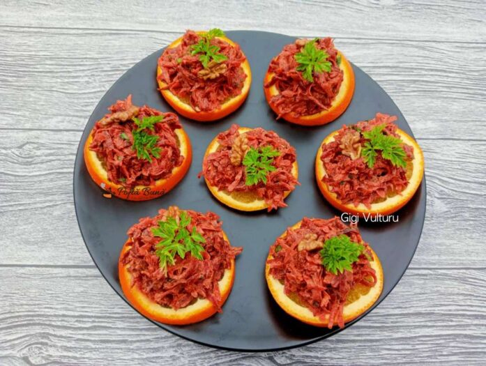 Sfecla rosie pe felii de portocala