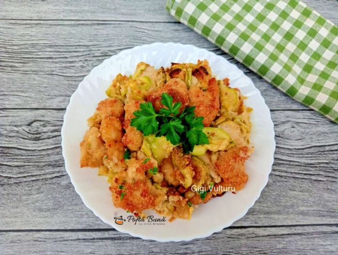 dovlecei gratinati piept pui reteta gina bradea 1 697x525 - Ceapa rosie cu rosii cherry si capere gratinate