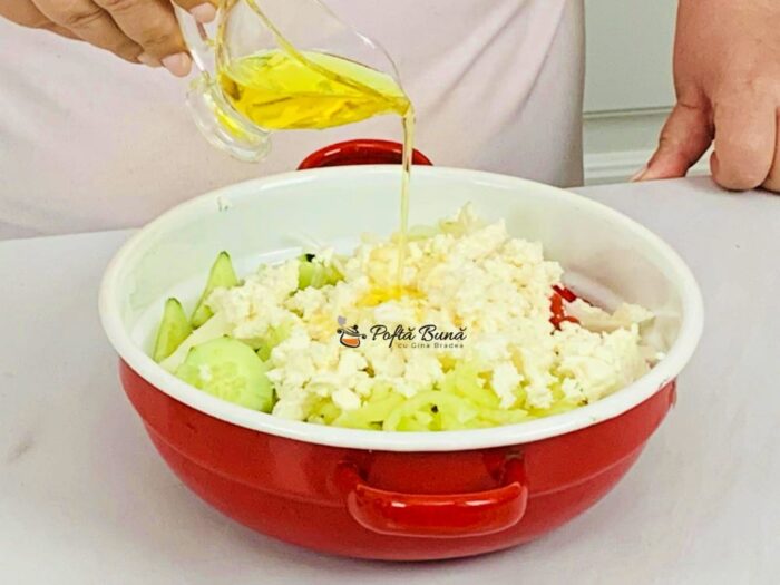 Salata de rosii cu castraveti si branza salata rosii castraveti branza reteta gina bradea 8 700x525 - Salata de rosii cu castraveti si branza