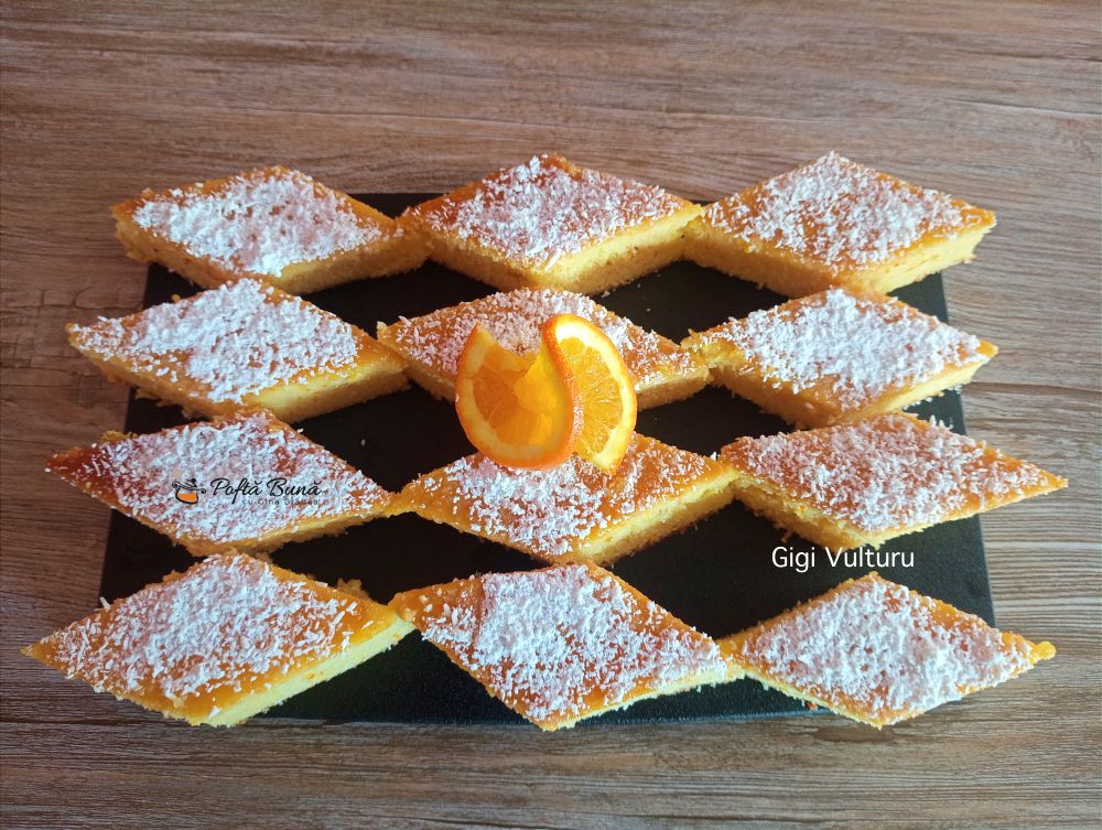 Prajitura cu gris insiropata cu suc de portocale