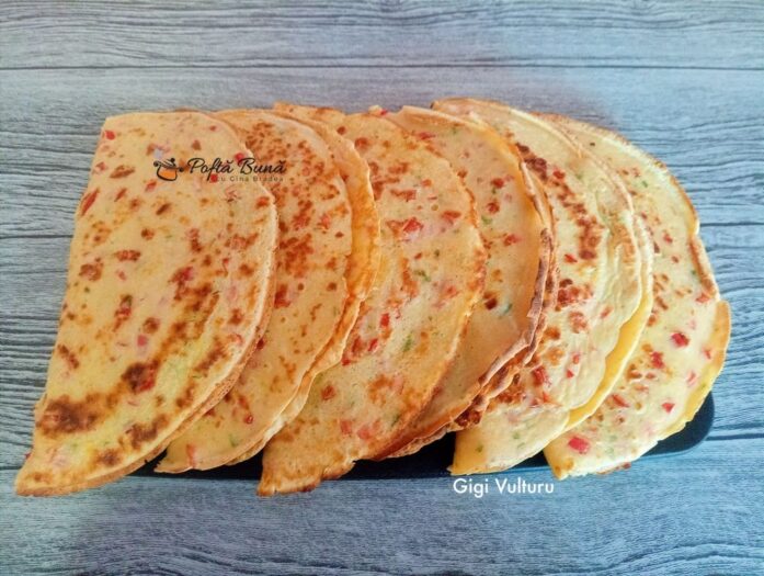 Placinte din aluat de clatite clatite aperitiv ardei cascaval reteta gina bradea 2 697x525 - Placinte din aluat de clatite