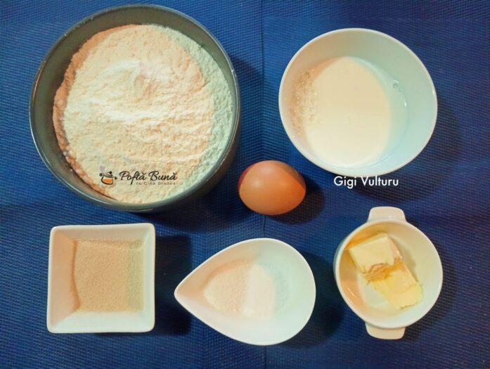 Paine cu unt si cascaval paine unct cascaval reteta gina bradea 1 697x525 - Paine cu unt si cascaval