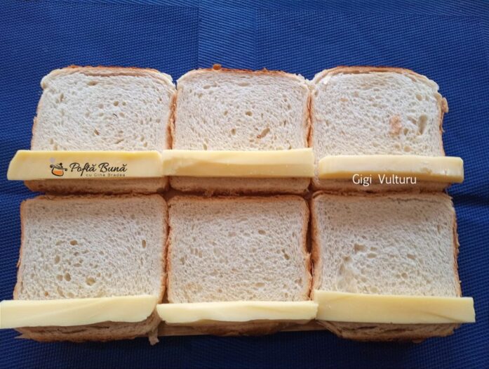 aperitiv paine cascaval bacon reteta gina bradea 4 697x525 - Aperitiv din paine toast, cascaval si bacon