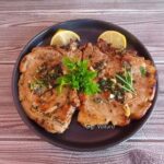 Cotlet de porc cu unt, patrunjel si usturoi