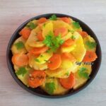 Telina cu portocale, morcovi si cartofi la tigaie