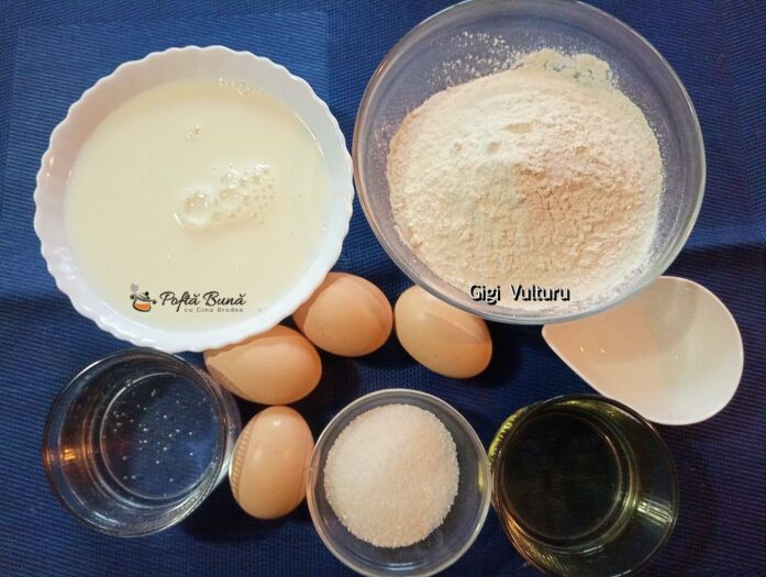 tort clatite crema mascarpone ciocolata reteta 1 697x525 - Tort din clatite cu crema de mascarpone si ciocolata