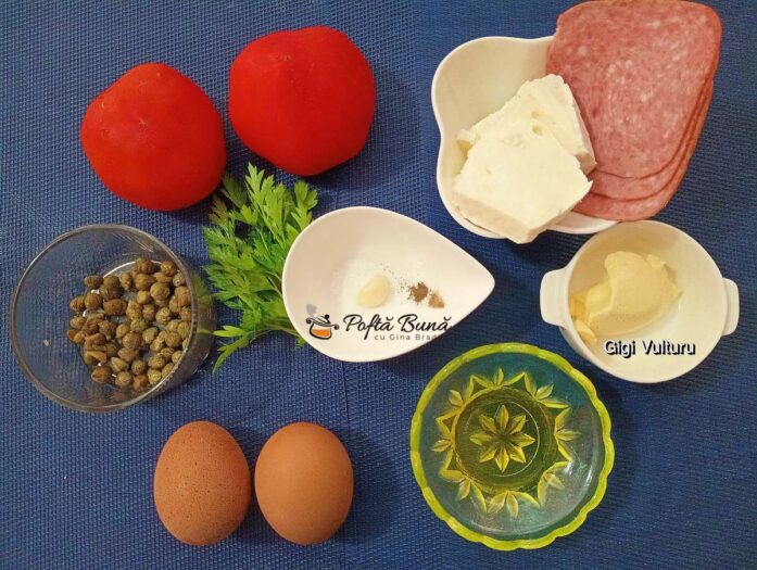 Aperitiv din roșii cu ouă, brânză și salam